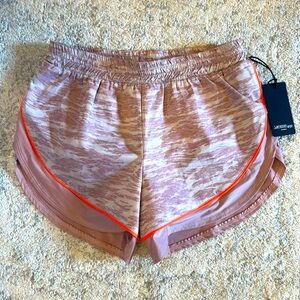 NWT woman Lanston sport athletic shorts. Measuring to be a XS/S.